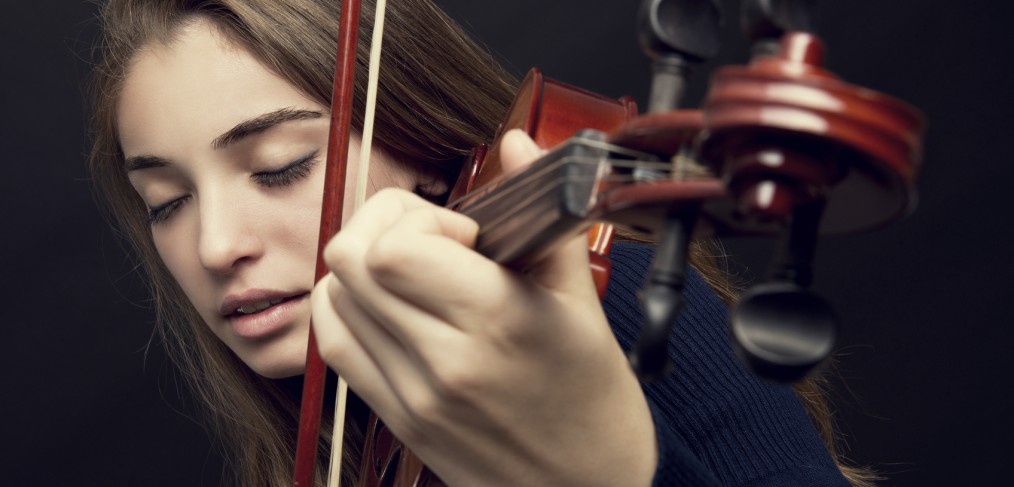 Habit. Girl practicing violin.